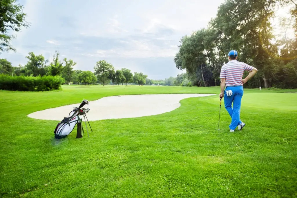 A golfer on a golf course